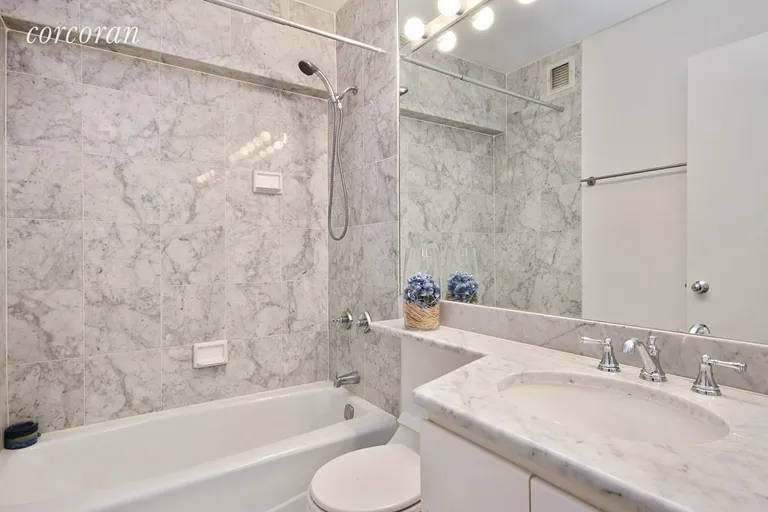 New York City Real Estate | View 45 East 25th Street, 10E | Carrara Marble bathroom | View 2