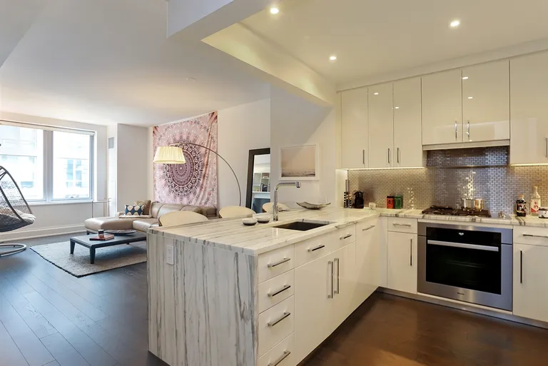 New York City Real Estate | View 50 Riverside Boulevard, 5E | Open chef's kitchen with breakfast bar  | View 2