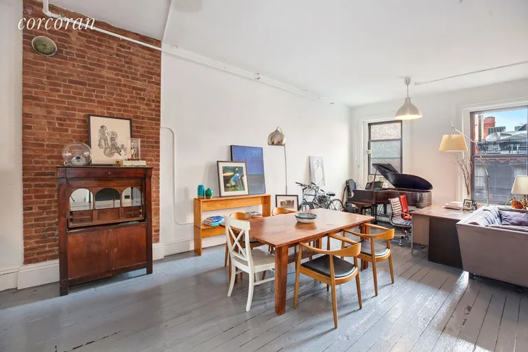 New York City Real Estate | View 577 Broadway, 4R | Over sized dining area with 11ft. ceilings | View 3
