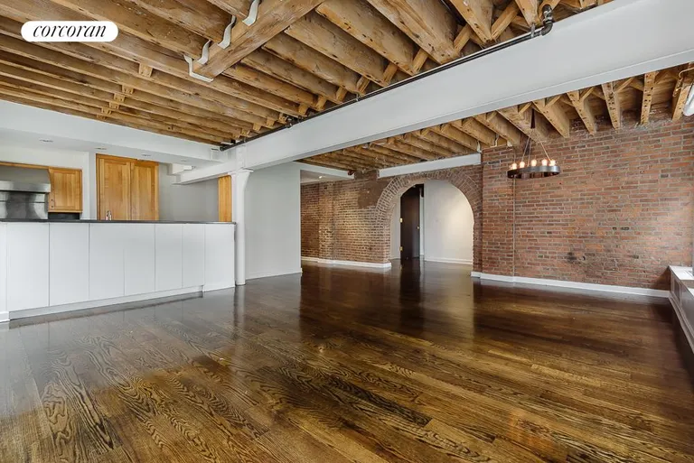 New York City Real Estate | View 62 Beach Street, 4E | Living/Dining Room with Beautiful Brick Archway | View 2