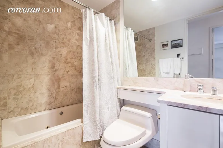 New York City Real Estate | View 100 United Nations Plaza, 16C | Marble Bathroom | View 5