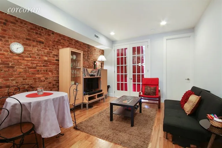 New York City Real Estate | View 275A Malcolm X Boulevard, 3 | Living Room / Dining Room | View 2