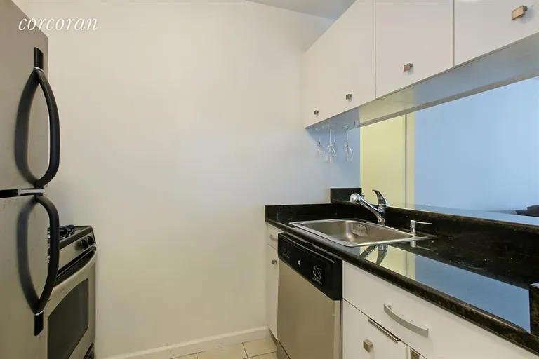 New York City Real Estate | View 45 East 25th Street, 16C | Pass-thru kitchen and stainless steel appliances | View 2