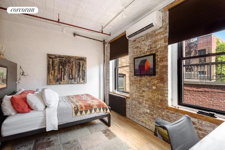 New York City Real Estate | View 325 West 16th Street, 4W | Bedroom with Exposed Brick | View 6