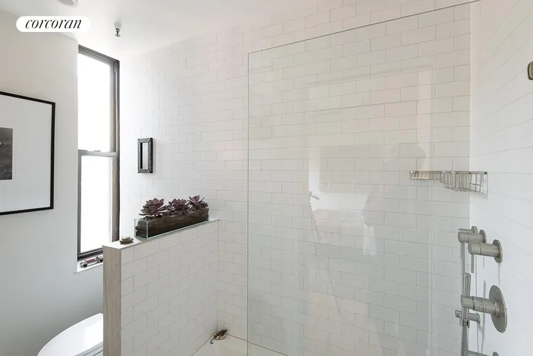 New York City Real Estate | View 325 West 16th Street, 4W | Windowed Renovated Bathroom | View 7