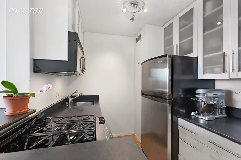 New York City Real Estate | View 201 East 17th Street, 30D | New Open Kitchen w Breakfast Bar  | View 2