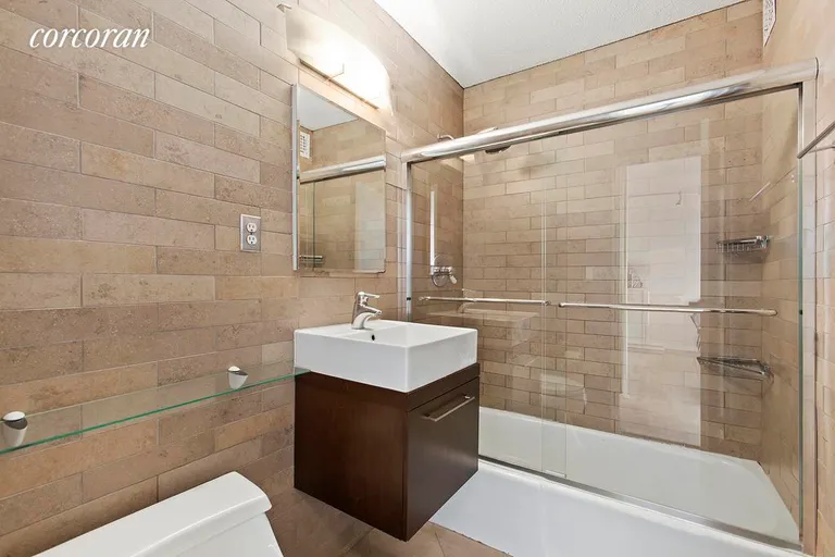 New York City Real Estate | View 201 East 17th Street, 30D | Stunning New Marble and Glass Bath | View 4