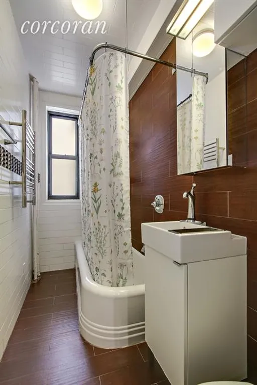 New York City Real Estate | View 135 Prospect Park Southwest, B5 | Towel heater, mini farm sink and tub/shower combo | View 4