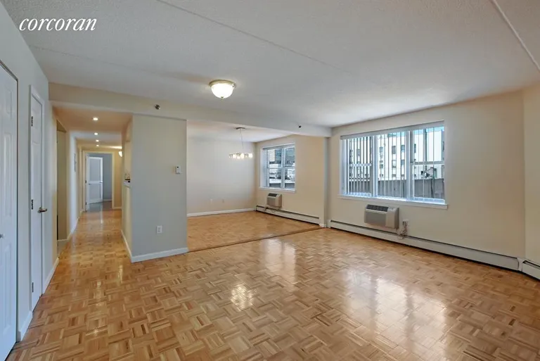 New York City Real Estate | View 106 West 117th Street, 5F | Living Room / Dining Room | View 2