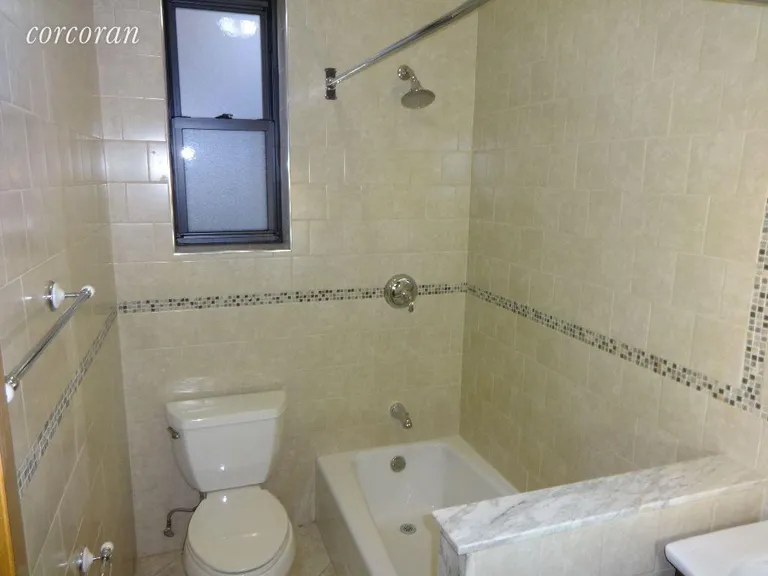 New York City Real Estate | View 762 Brady Avenue, 228 | Decor Tiled Bathroom | View 13