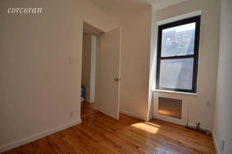 New York City Real Estate | View 202 Thompson Street, 23 | Abundance of Sunshine and 4 Large Windows  | View 2