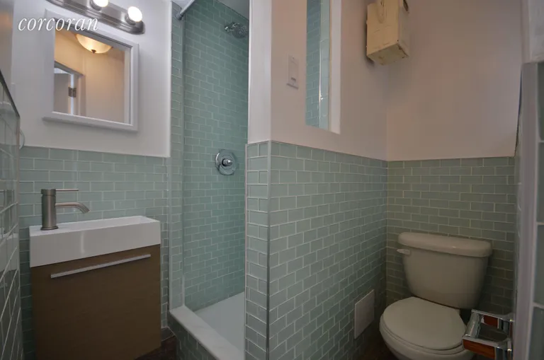 New York City Real Estate | View 202 Thompson Street, 23 | Fully Renovated, Windowed Bathroom | View 3