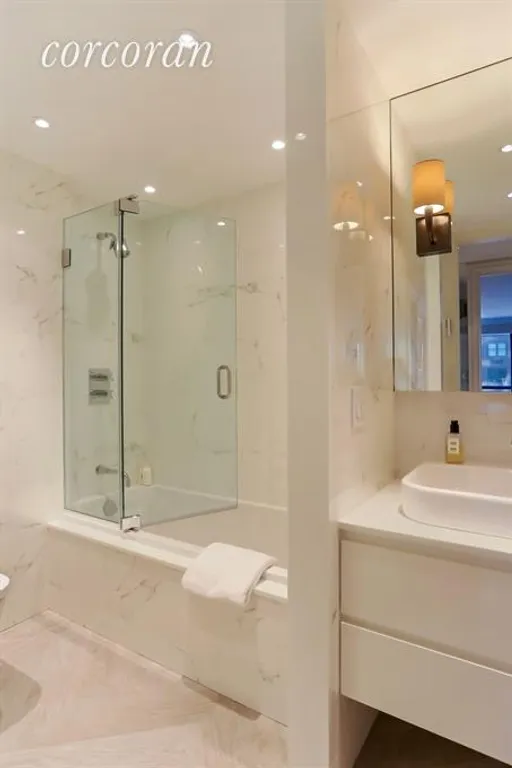 New York City Real Estate | View 190 East 72nd Street, 21B | Luxurious Master Bathroom w top of line fixtures | View 4