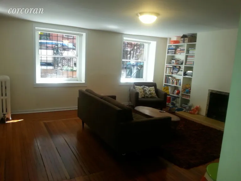 New York City Real Estate | View 115 State Street, GDN | Wood burning fireplace, great light | View 2