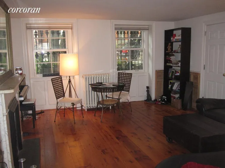 New York City Real Estate | View 236 Dean Street, 1 | Bright Living Room with Decorative Fireplace | View 2