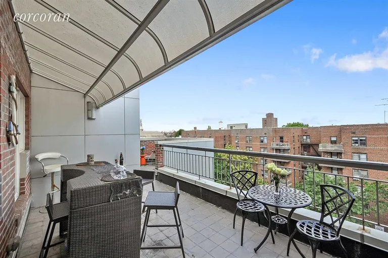 New York City Real Estate | View 1138 Ocean Avenue, 7C | Large terrace with canopy off the Living room | View 8