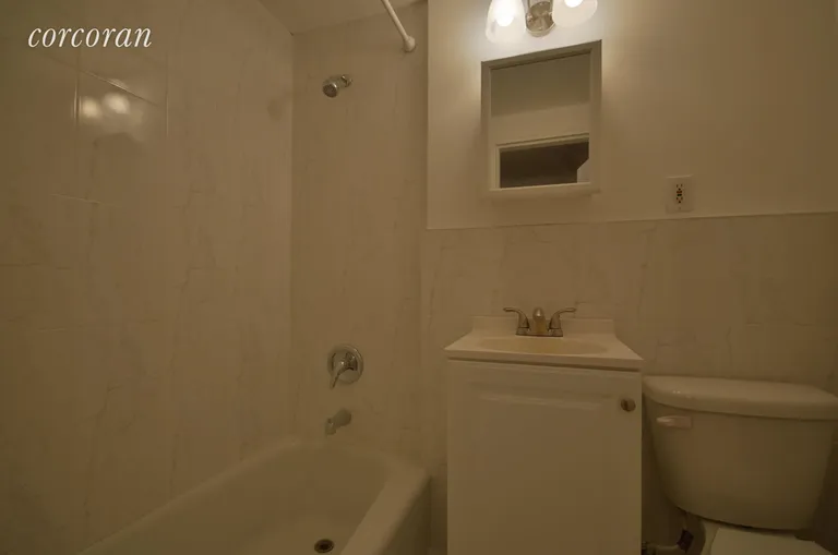 New York City Real Estate | View 222 East 75th Street, 2E | Renovated bathroom. | View 5