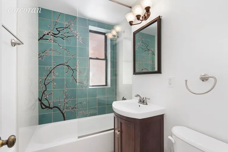 New York City Real Estate | View 30 East 9th Street, 2BB | Renovated windowed bathroom | View 8