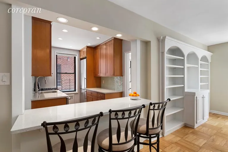 New York City Real Estate | View 30 East 9th Street, 2BB | Chef's kitchen with Breakfast Bar | View 2