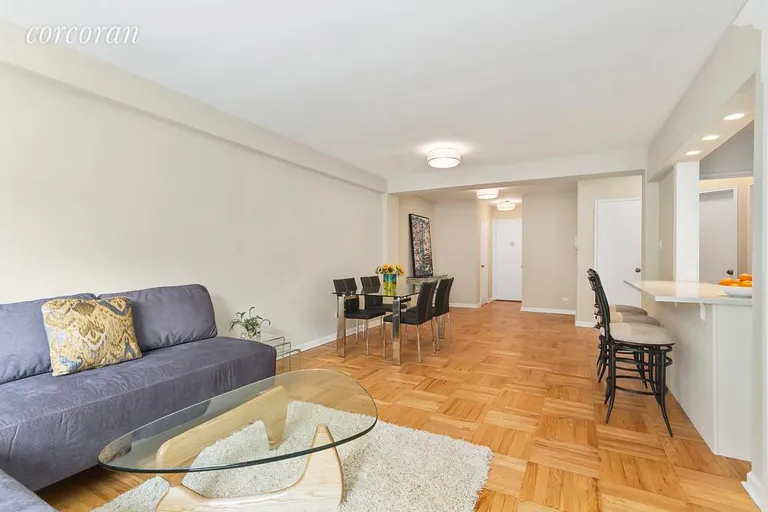 New York City Real Estate | View 30 East 9th Street, 2BB | Reverse view Living Room showing open kitchen | View 5