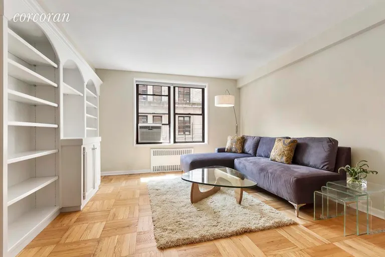 New York City Real Estate | View 30 East 9th Street, 2BB | Close up Living Area with built-ins | View 4