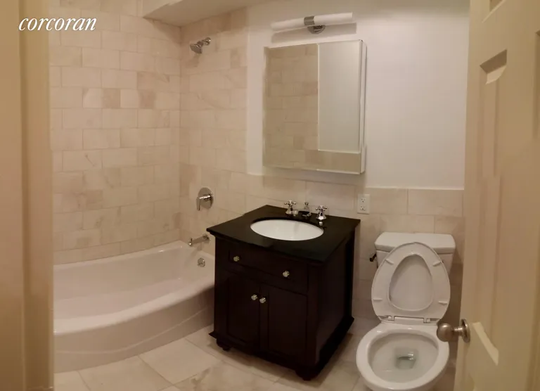 New York City Real Estate | View 38 West 69th Street, A | Clean renovated bathroom | View 3