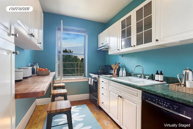 New York City Real Estate | View 407 Central Park West, 4C | Windowed kitchen overlooking Central Park | View 4