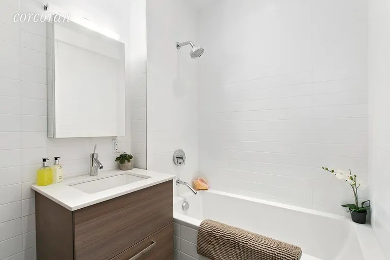 New York City Real Estate | View 701 Union Street, 1B | Clean Lines and Upscale Finishes in the Bathrooom | View 5