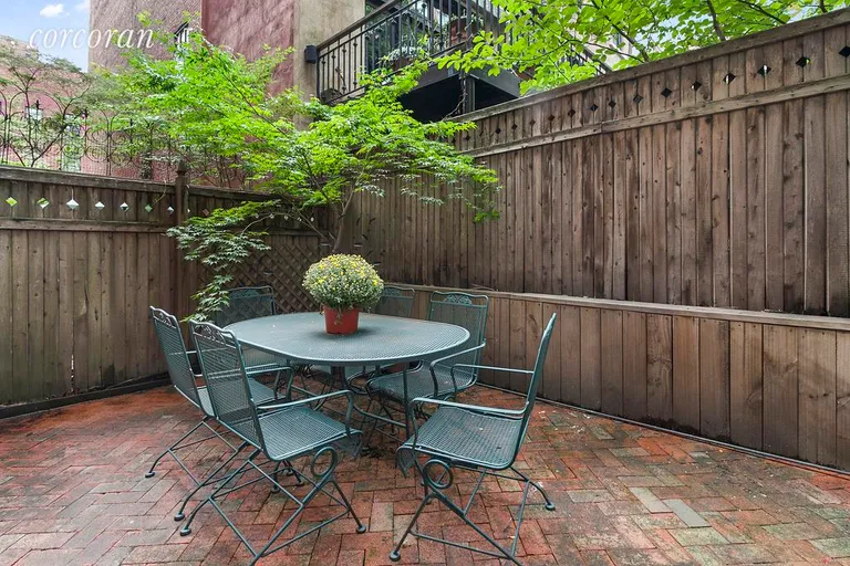 New York City Real Estate | View 141 West 13th Street, 104 | Entertainer’s oasis - sunny private garden | View 10