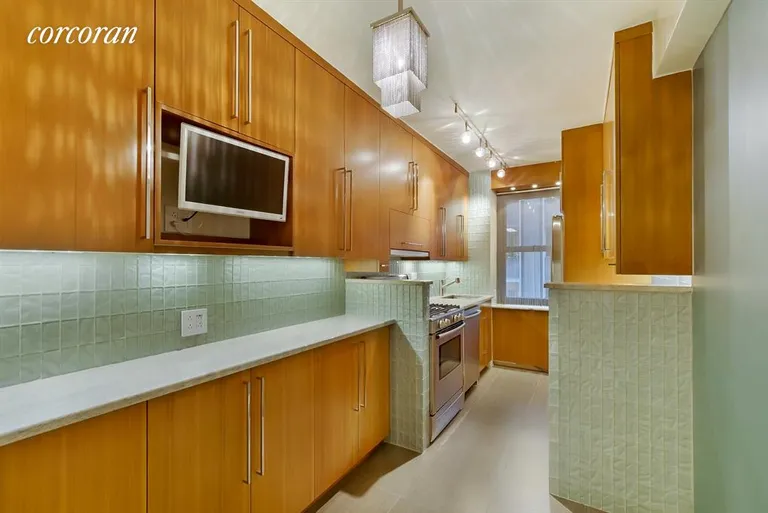 New York City Real Estate | View 135 East 54th Street, 6B | Windowed eat-in kitchen with Bosch appliances | View 4
