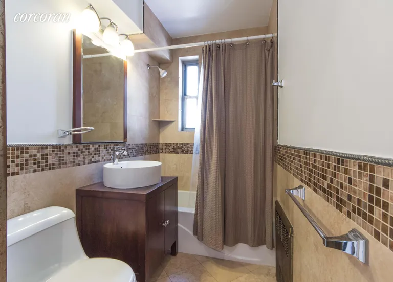New York City Real Estate | View 170 West 23rd Street, 4J | Spa like marble bathroom | View 4