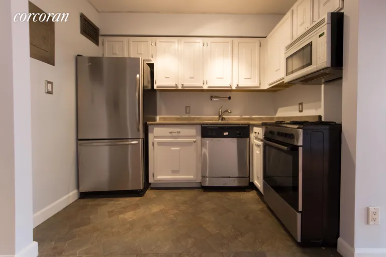 New York City Real Estate | View 170 West 23rd Street, 4J | Renovated kitchen with new s/s appliances | View 2