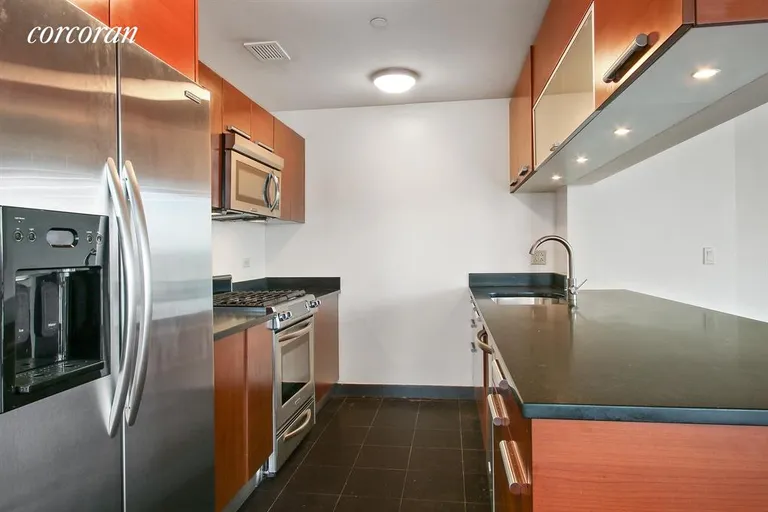 New York City Real Estate | View 1485 Fifth Avenue, 14H | Open kitchen with breakfast bar | View 3