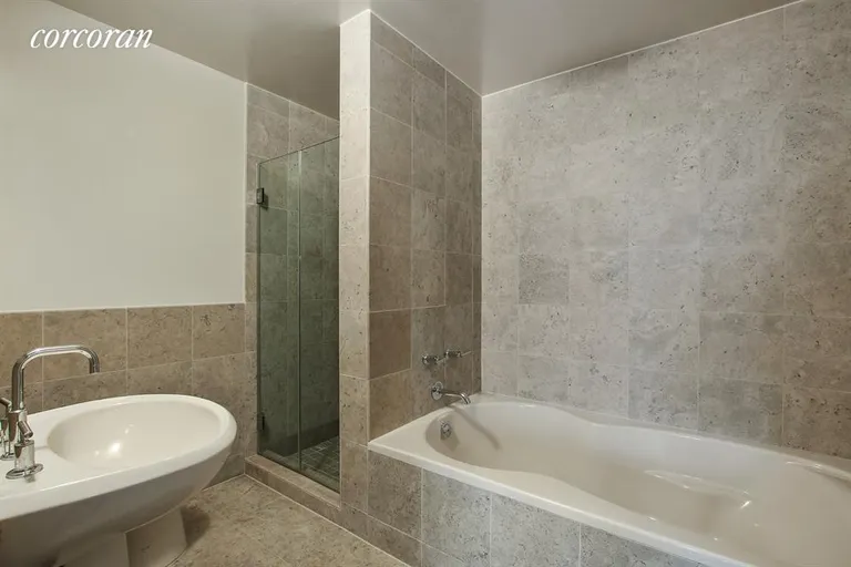 New York City Real Estate | View 1485 Fifth Avenue, 14H | Stone master bathroom with soaking tub | View 5