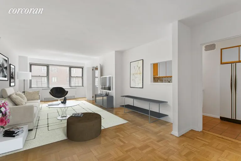 New York City Real Estate | View 525 East 86th Street, 8G | Large living room and pass through kitchen. | View 4