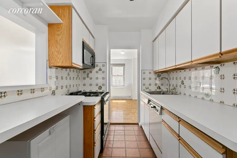New York City Real Estate | View 525 East 86th Street, 8G | Pass through kitchen with plenty of counter space. | View 5