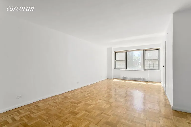 New York City Real Estate | View 525 East 86th Street, 8G | Large living room facing south. | View 7