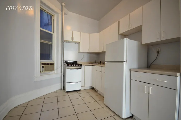 New York City Real Estate | View 18 North Moore Street, 4F | Eat-In, Windowed Kitchen w/ lots of Cabinet Space! | View 3