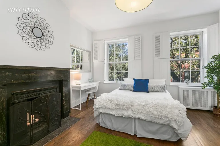 New York City Real Estate | View 12 Cheever Place, 2 | Master Bedroom with Working Wood Burning Fireplace | View 3