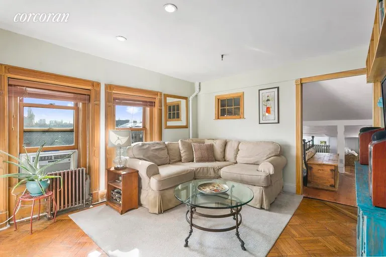 New York City Real Estate | View 19 7th Avenue, 4 | Living room windows overlook Park Slope treetops | View 2
