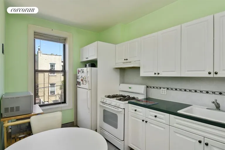New York City Real Estate | View 561 74th Street | Clean and bright Kitchen in Rental Unit | View 8