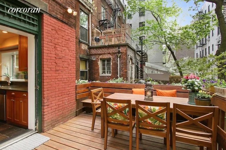 New York City Real Estate | View 8 Pierrepont Street, 1 | Deck off kitchen with steps to garden | View 14