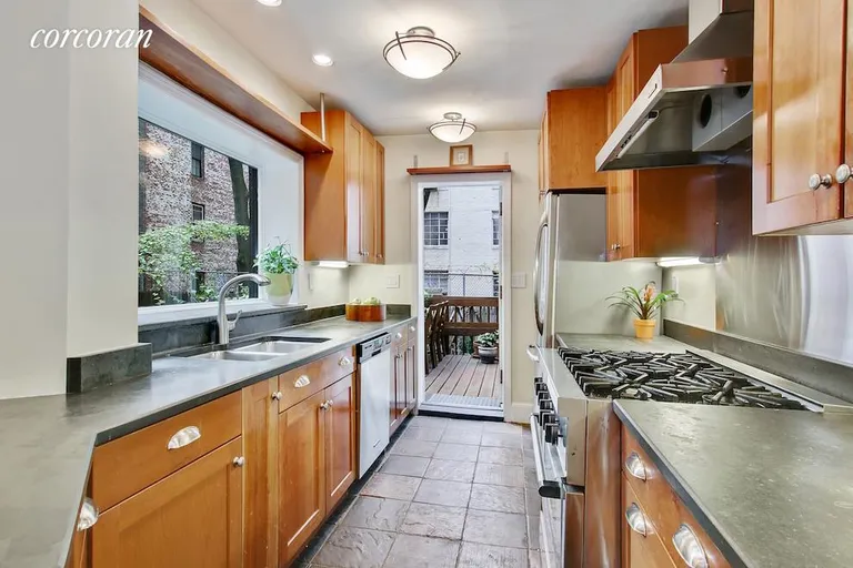 New York City Real Estate | View 8 Pierrepont Street, 1 | Kitchen looking toward backyard and deck | View 5