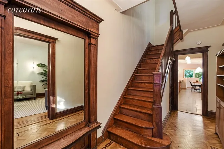 New York City Real Estate | View 435 76th Street | Entry Foyer Highlighted by Original Pier Mirror  | View 8