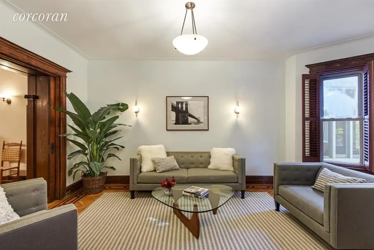 New York City Real Estate | View 435 76th Street | Living Room Graced with Beautiful Original Details | View 3