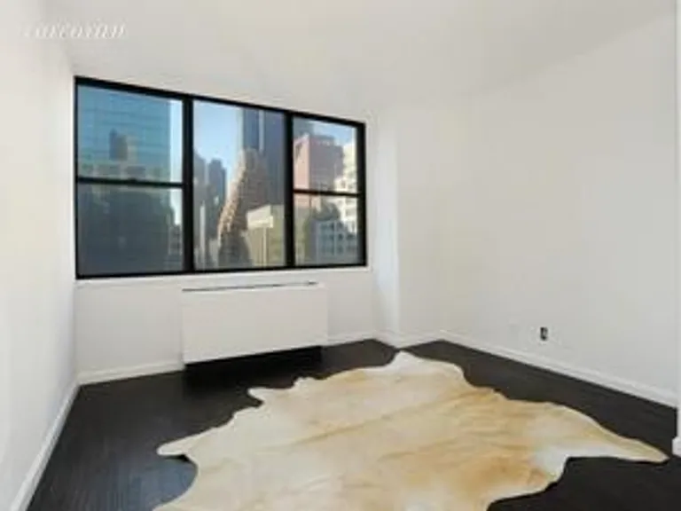New York City Real Estate | View 301 East 45th Street, 12D | room 2 | View 3