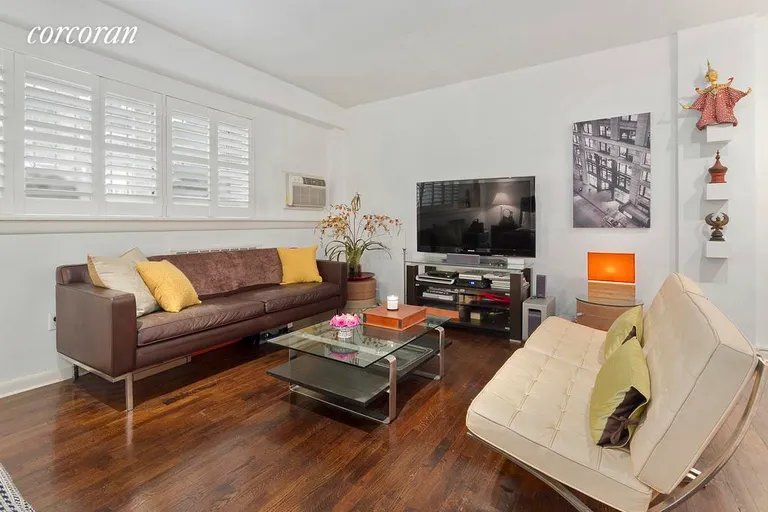 New York City Real Estate | View 2 King Street, 1D | Beautiful living room with hardwood floors. | View 3