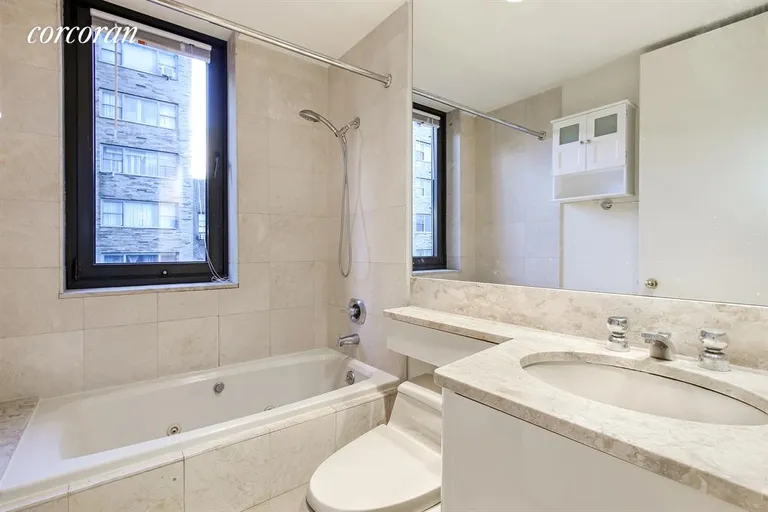 New York City Real Estate | View 100 United Nations Plaza, 5G | Ensuite Marble Master Bath | View 4