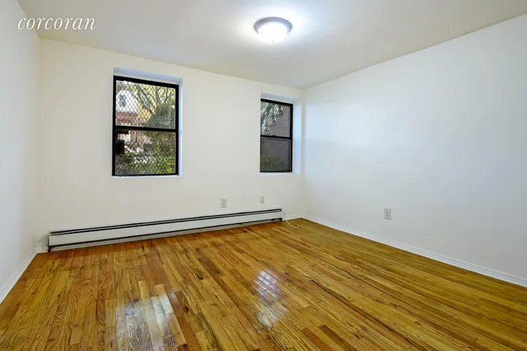 New York City Real Estate | View 379 Gates Avenue | Garden level bedroom  | View 14