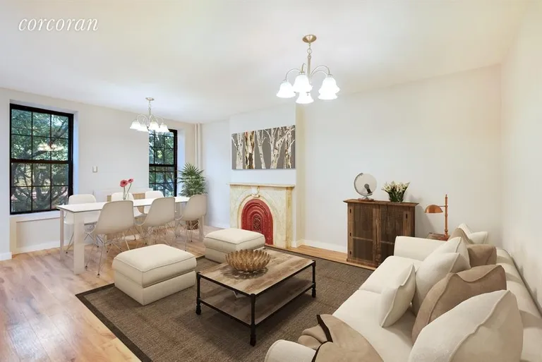 New York City Real Estate | View 379 Gates Avenue | Living room with lovely original details | View 2